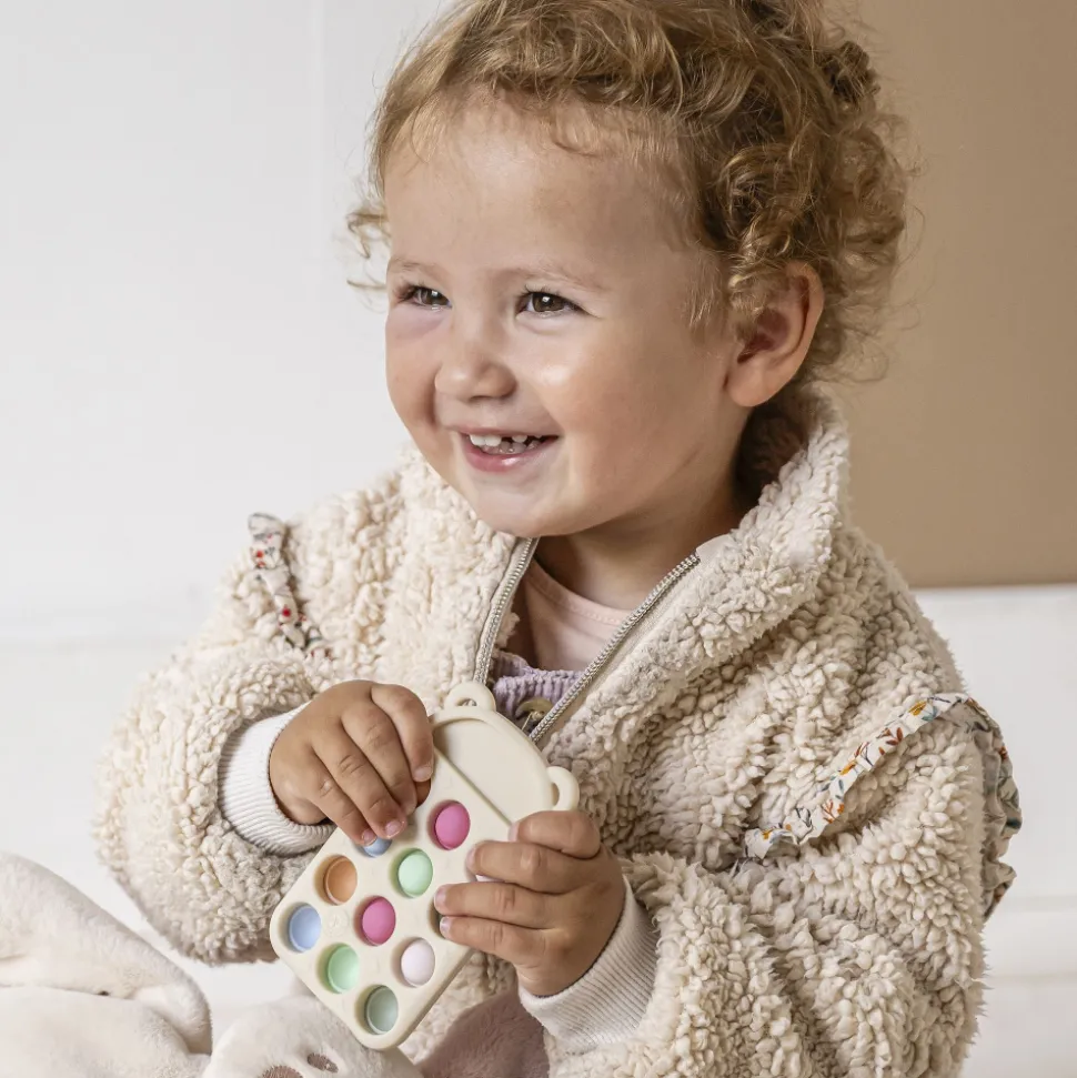 Anneau dentition pop en silicone it télécommande