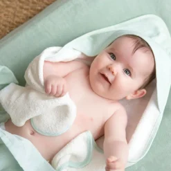 Cape de bain et gant au large de nova