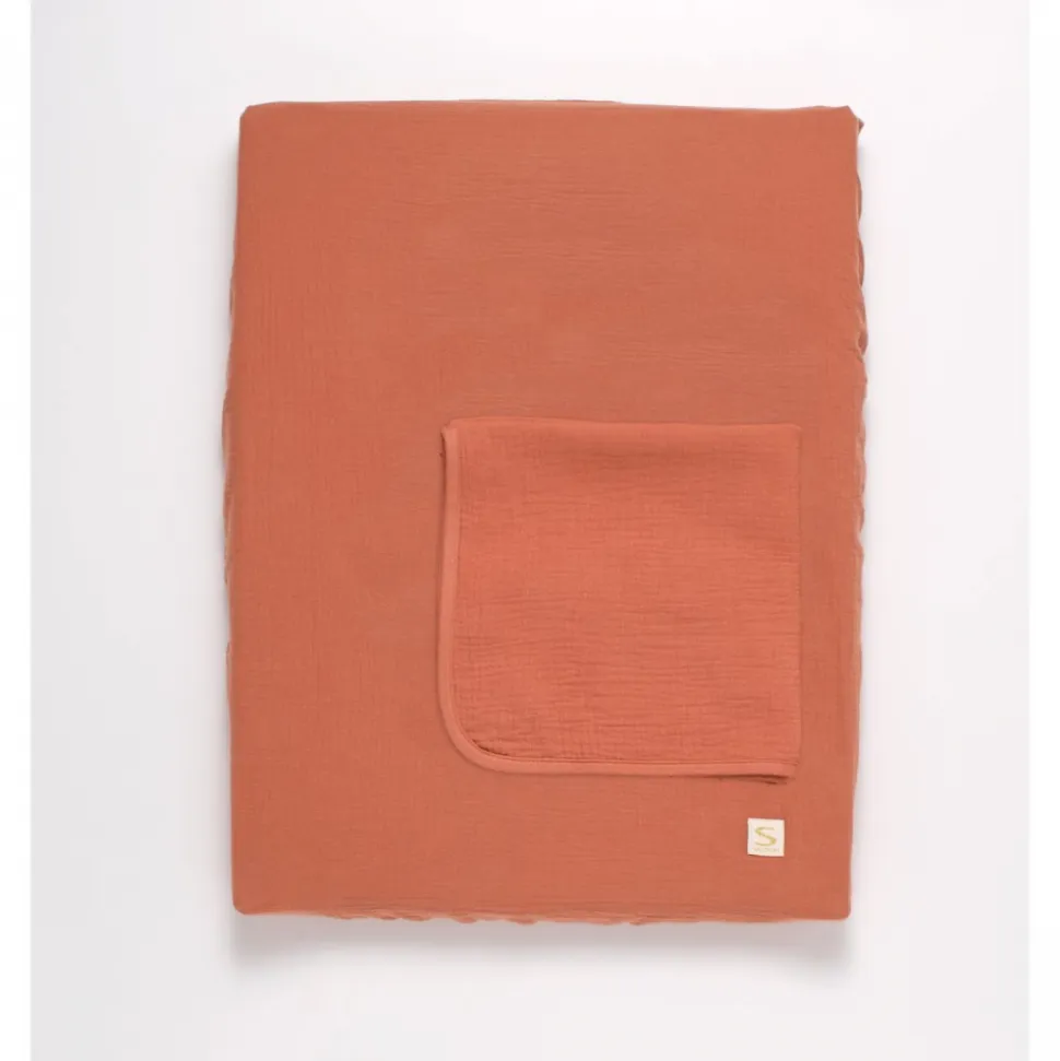 Matelas à langer avec housse et serviette uni terracotta