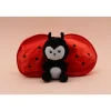 Peluche réversible flipetz coccinelle et tomate