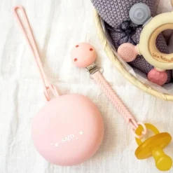 Porte sucettes en silicone rose