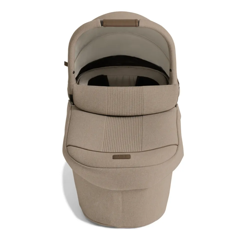 Poussette trio versiti + siège auto i-snug 2 cashew + nacelle ramble xl sandstone