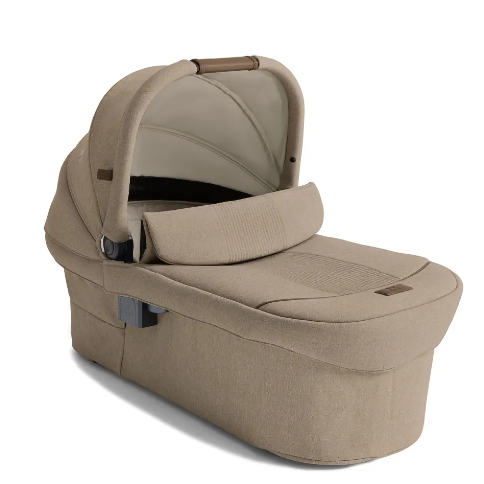Poussette trio versiti + siège auto i-snug 2 cashew + nacelle ramble xl sandstone