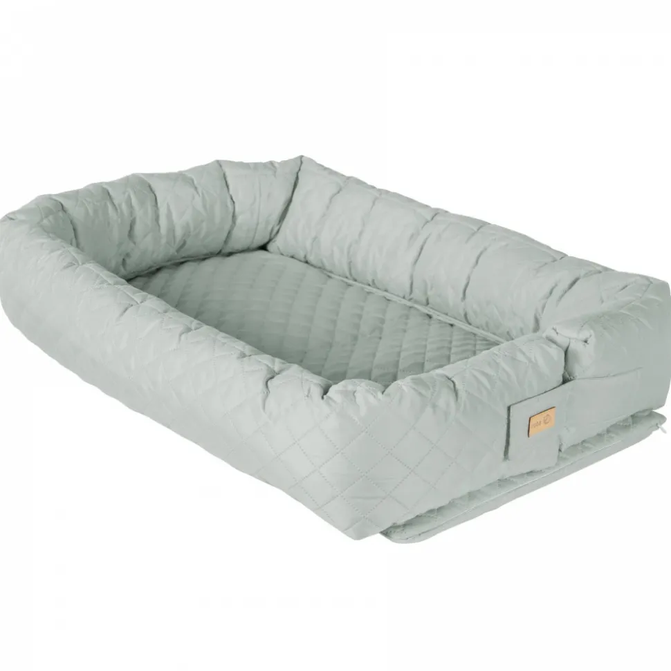 Réducteur de lit bébé vert