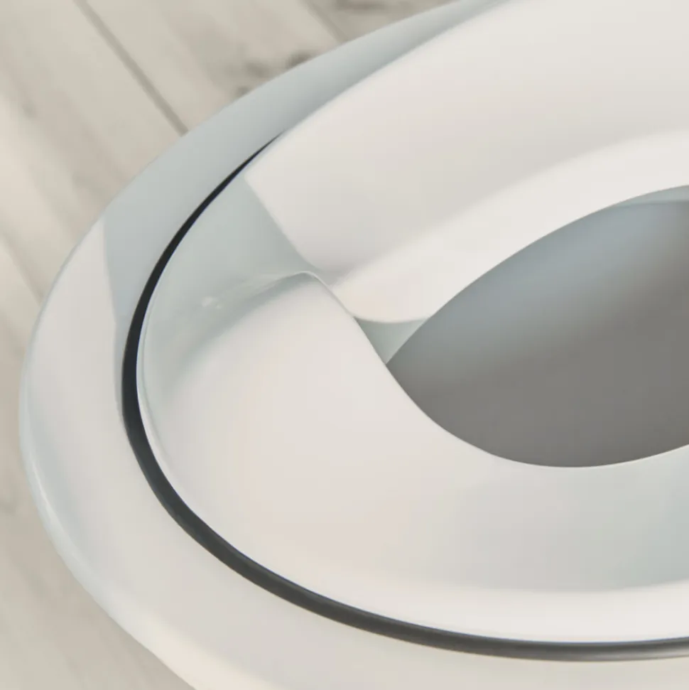 Réducteur de toilette blanc et noir