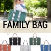 Sac à langer family bag signature canvas vert