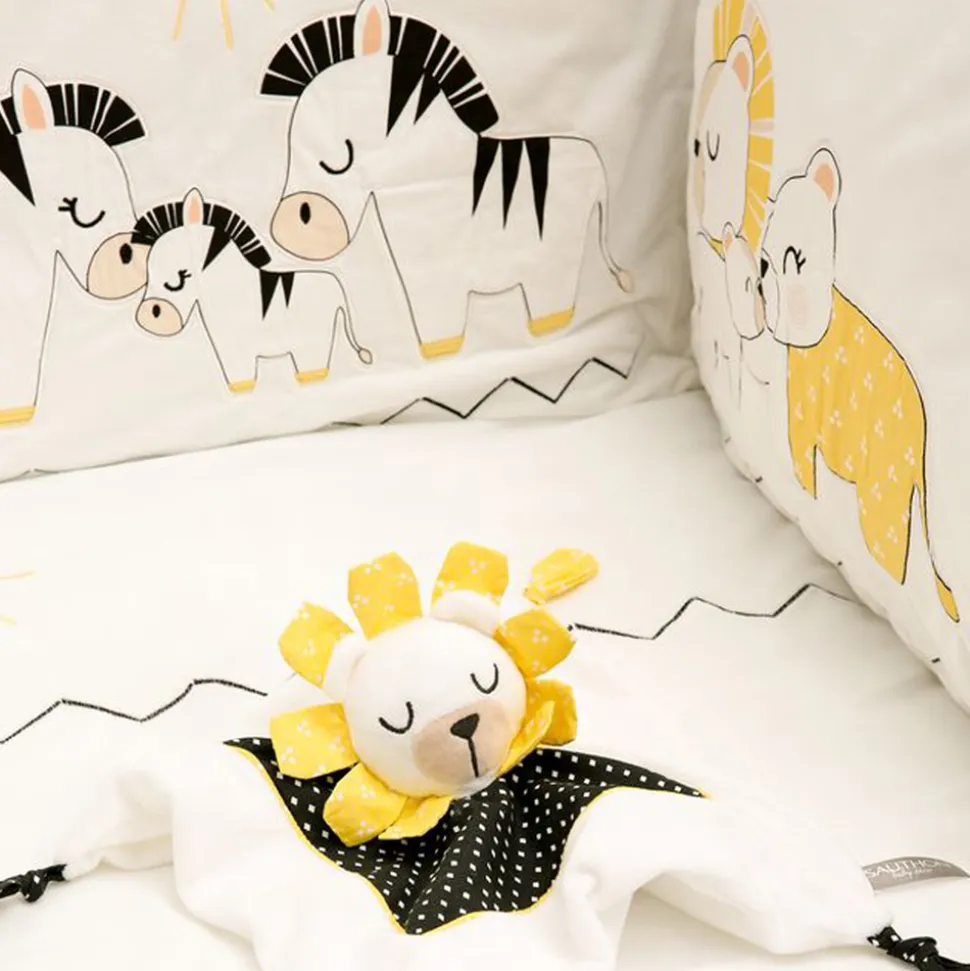 Tour de lit bébé pluche et pompon