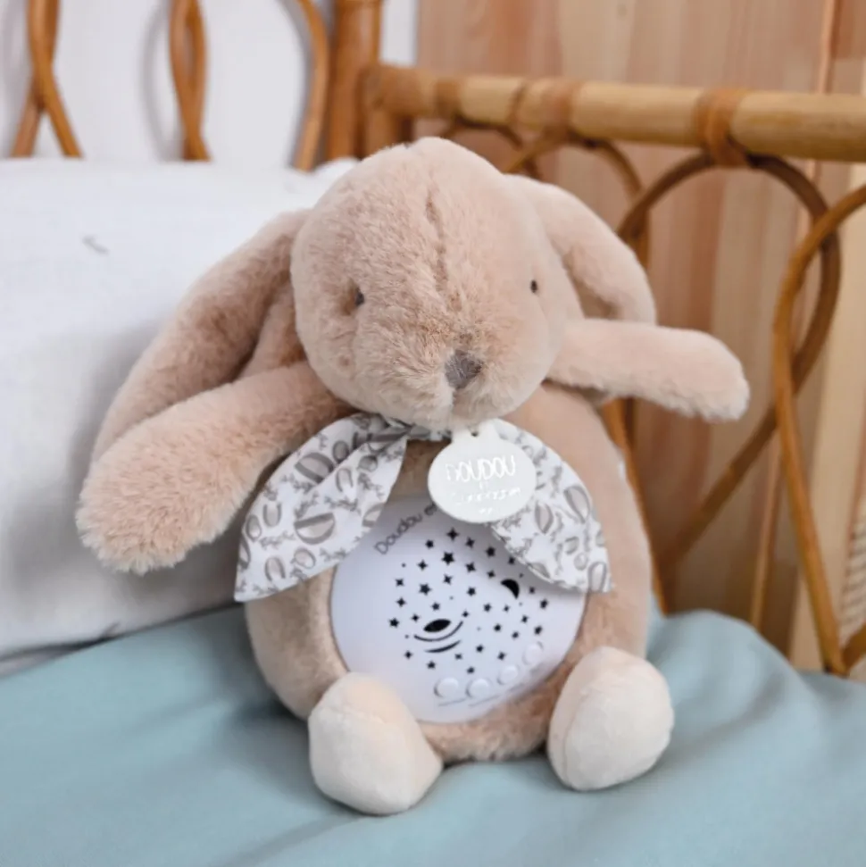 Veilleuse musicale projection d'étoiles lapin doudou beige sable